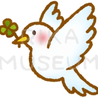 四つ葉のクローバーをくわえた鳩のイラスト